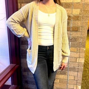 Soft cardigan with pockets. Has original tags in it.